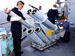 Royal Navy Loading Chaff Rockets